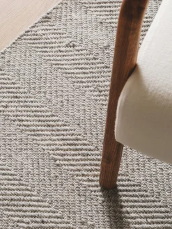 Alfombra artesanal de lana con flecos Lars