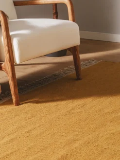 Alfombra artesanal de lana con flecos Liv