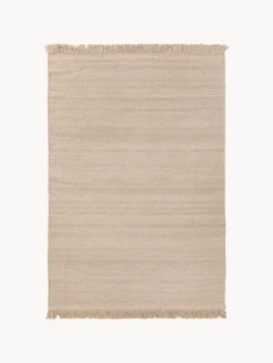 Alfombra artesanal de lana con flecos Lars