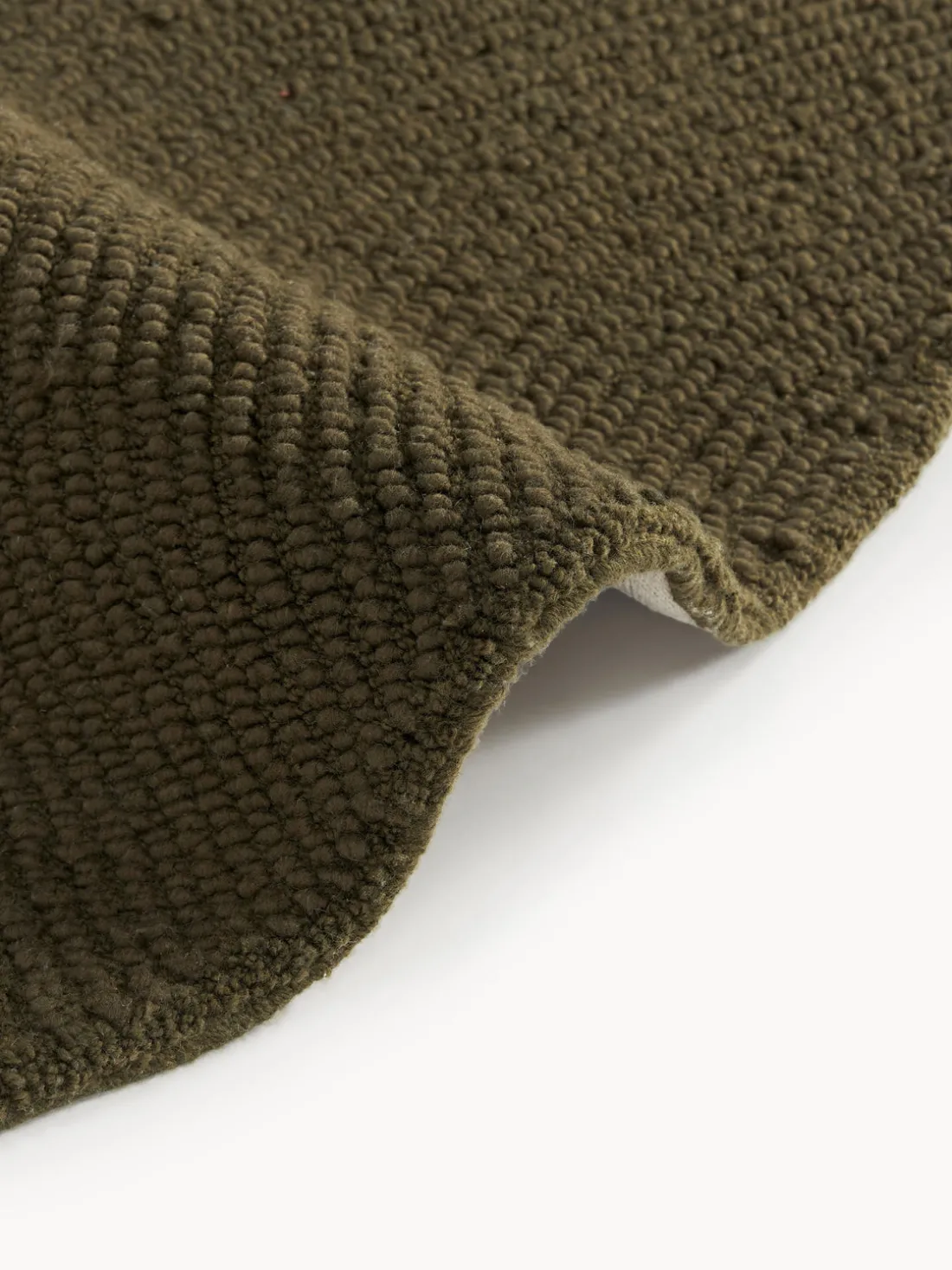 Alfombra artesanal redonda de lana Eleni