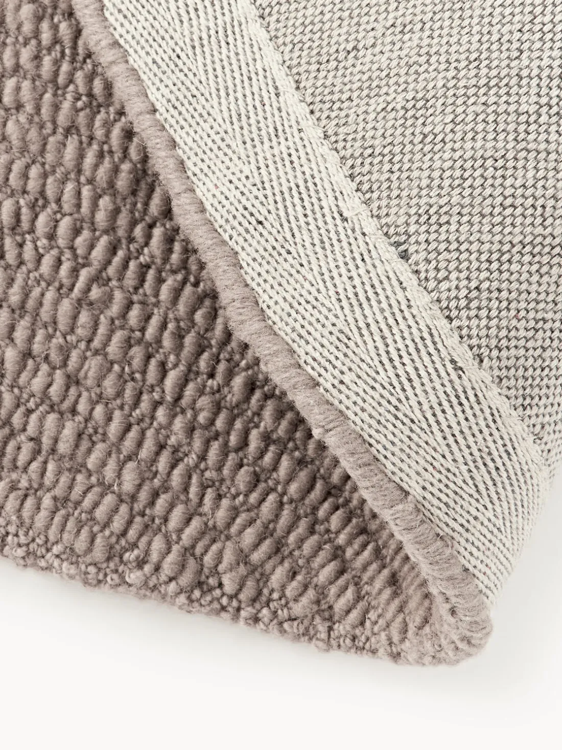 Alfombra artesanal redonda de lana Eleni