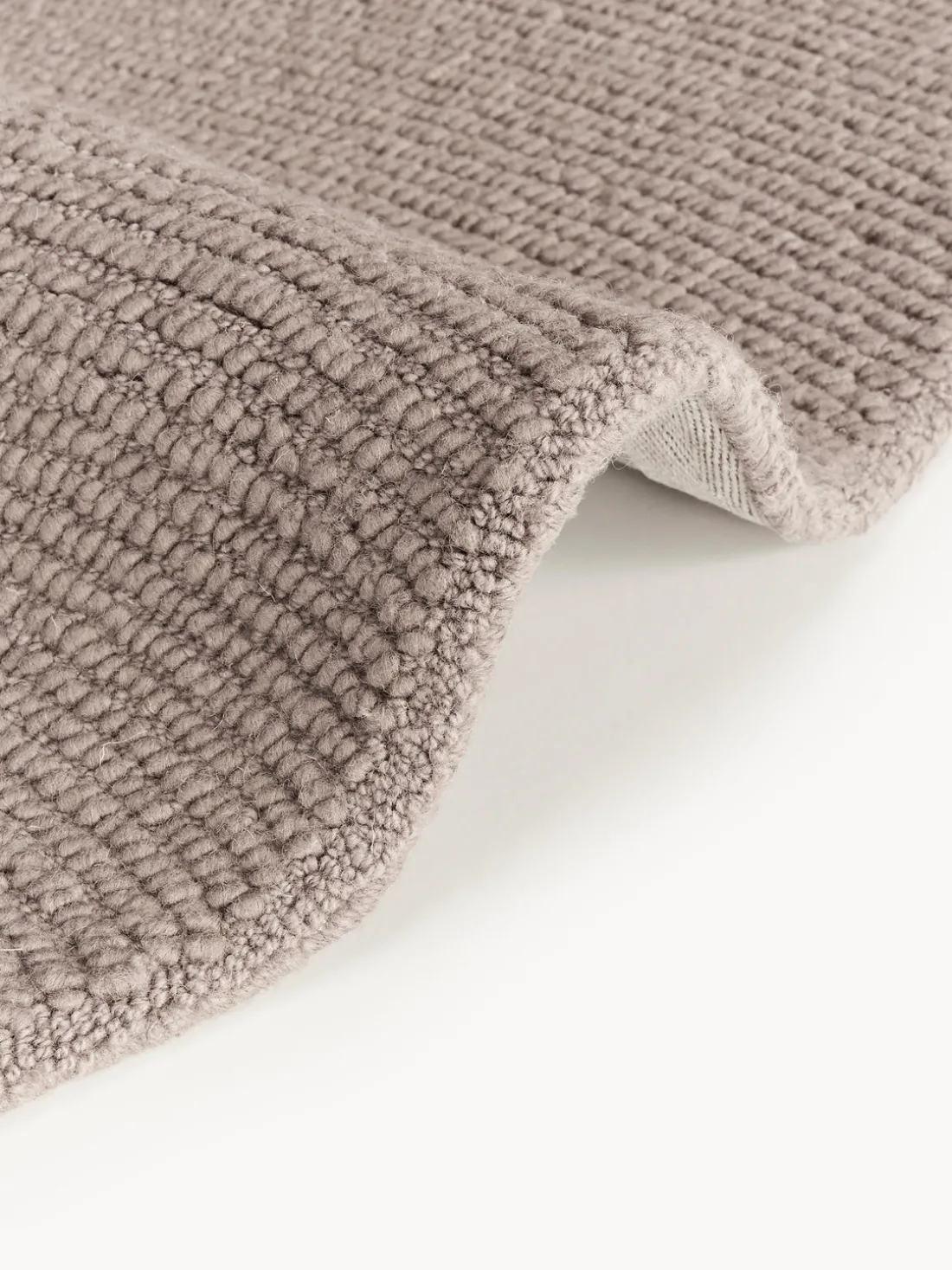 Alfombra artesanal redonda de lana Eleni