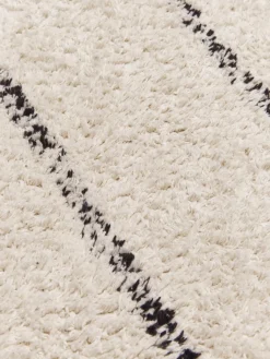 Alfombra corredor artesanal de algodón con diseño de rombos y flecos Bina