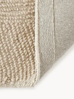 Alfombra de lana redonda artesanal de pelo corto Eleni