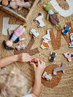 Alfombra infantil redonda de yute Dinne