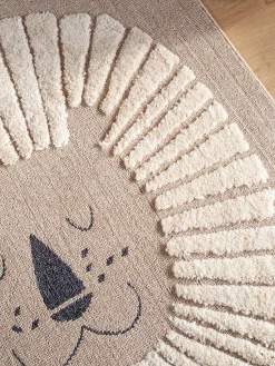 Alfombra infantil texturizada con borlas Momo