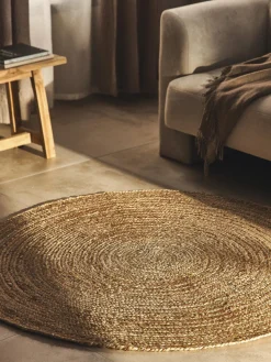 Alfombra redonda artesanal de yute Sharmila