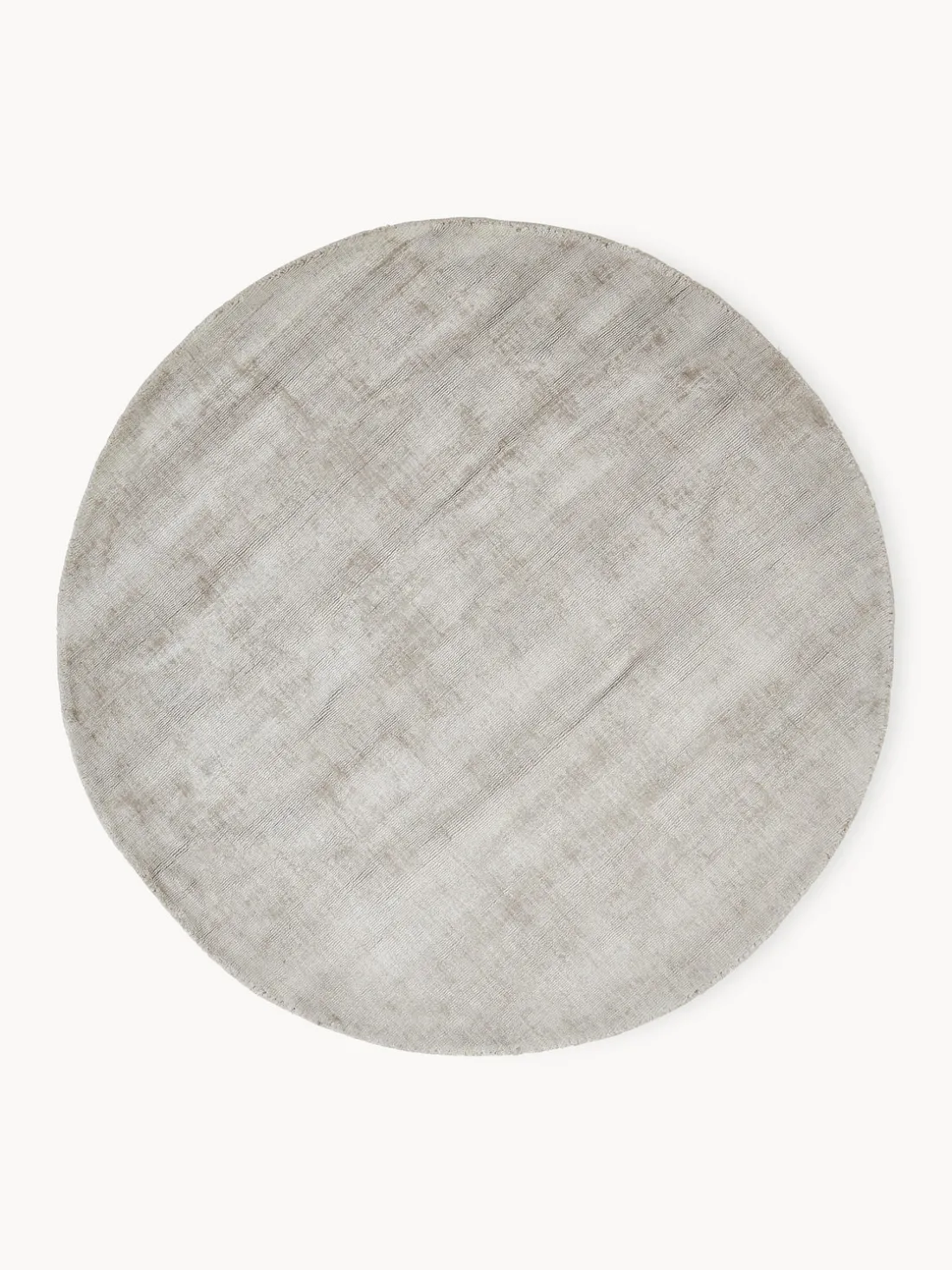 Alfombra redonda artesanal de viscosa Jane