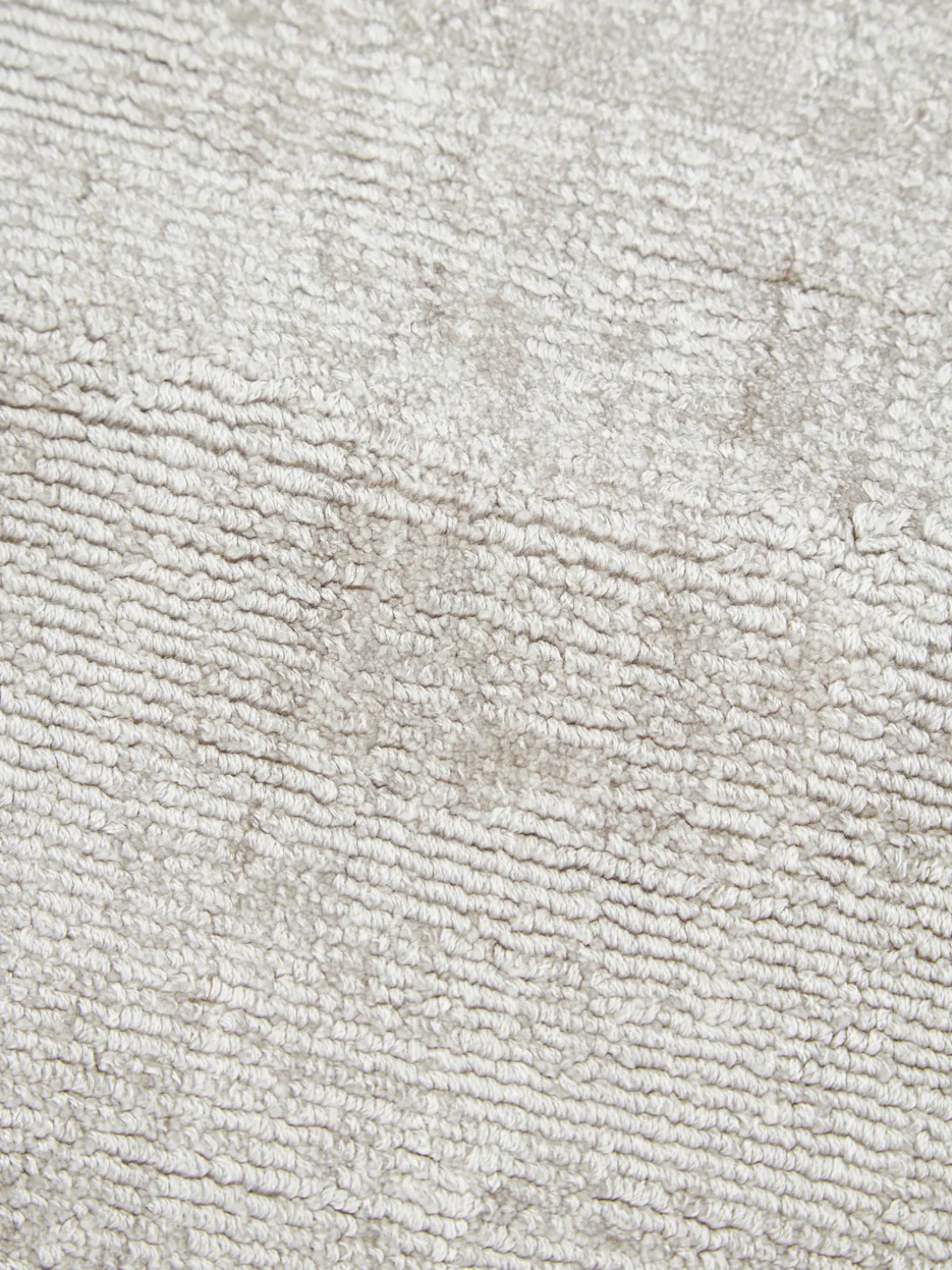 Alfombra redonda artesanal de viscosa Jane