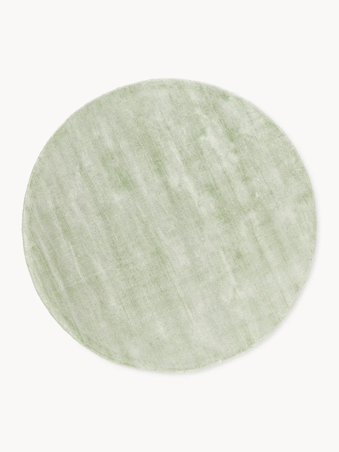 Alfombra redonda artesanal de viscosa Jane
