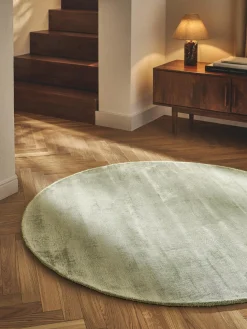 Alfombra redonda artesanal de viscosa Jane