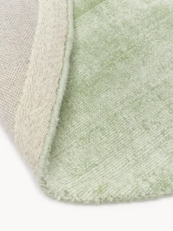 Alfombra redonda artesanal de viscosa Jane