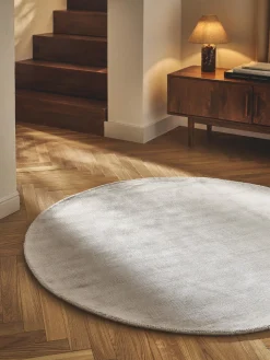 Alfombra redonda artesanal de viscosa Jane
