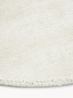 Alfombra redonda artesanal de viscosa Jane