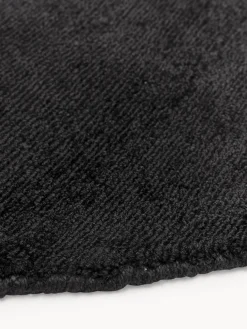 Alfombra redonda artesanal de viscosa Jane