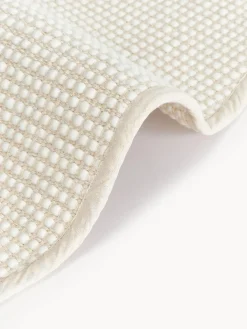 Alfombra redonda artesanal de lana Amaro