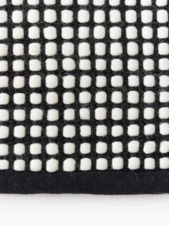 Alfombra redonda artesanal de lana Amaro