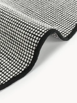 Alfombra redonda artesanal de lana Amaro