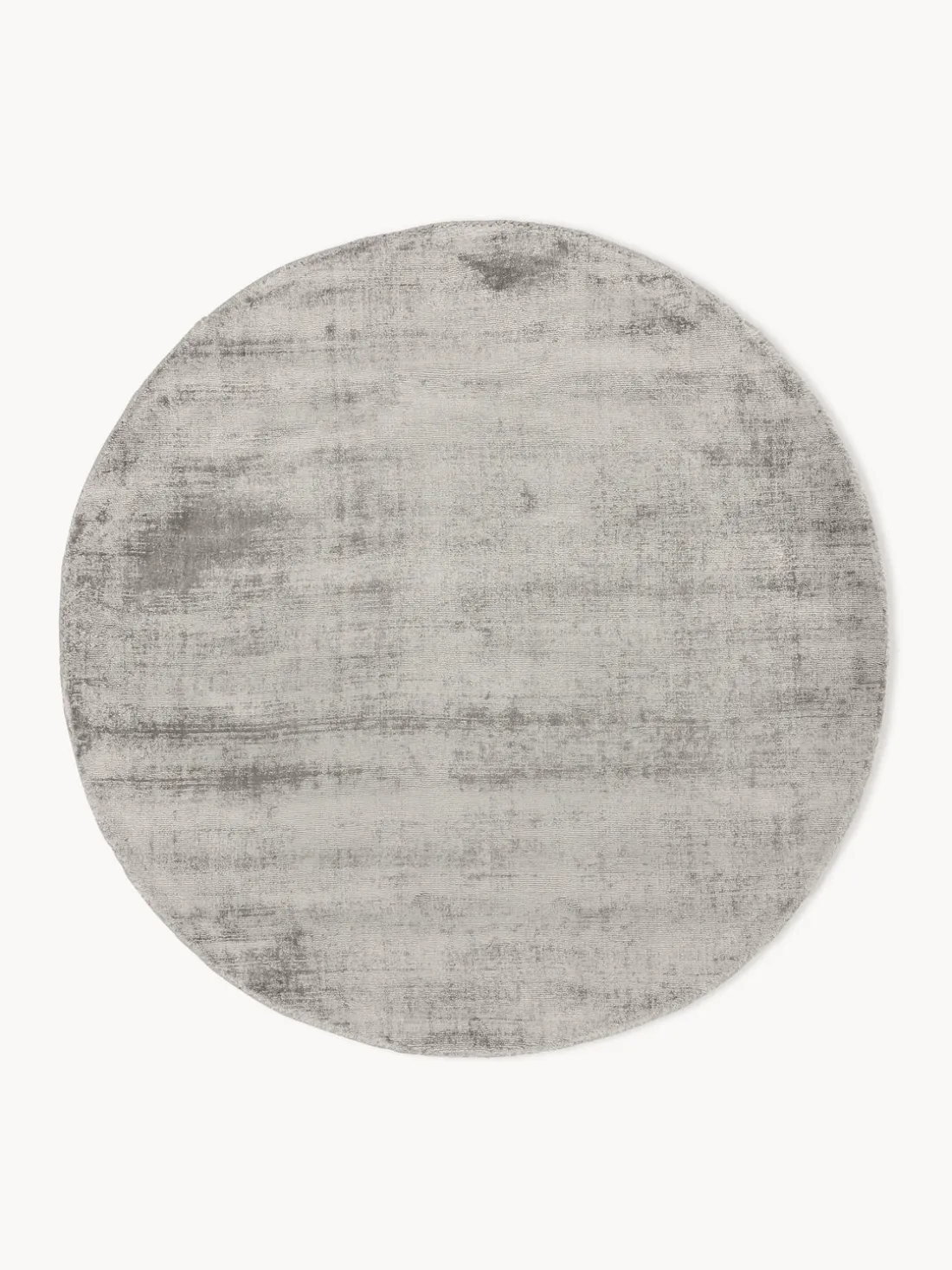 Alfombra redonda artesanal de viscosa Jane