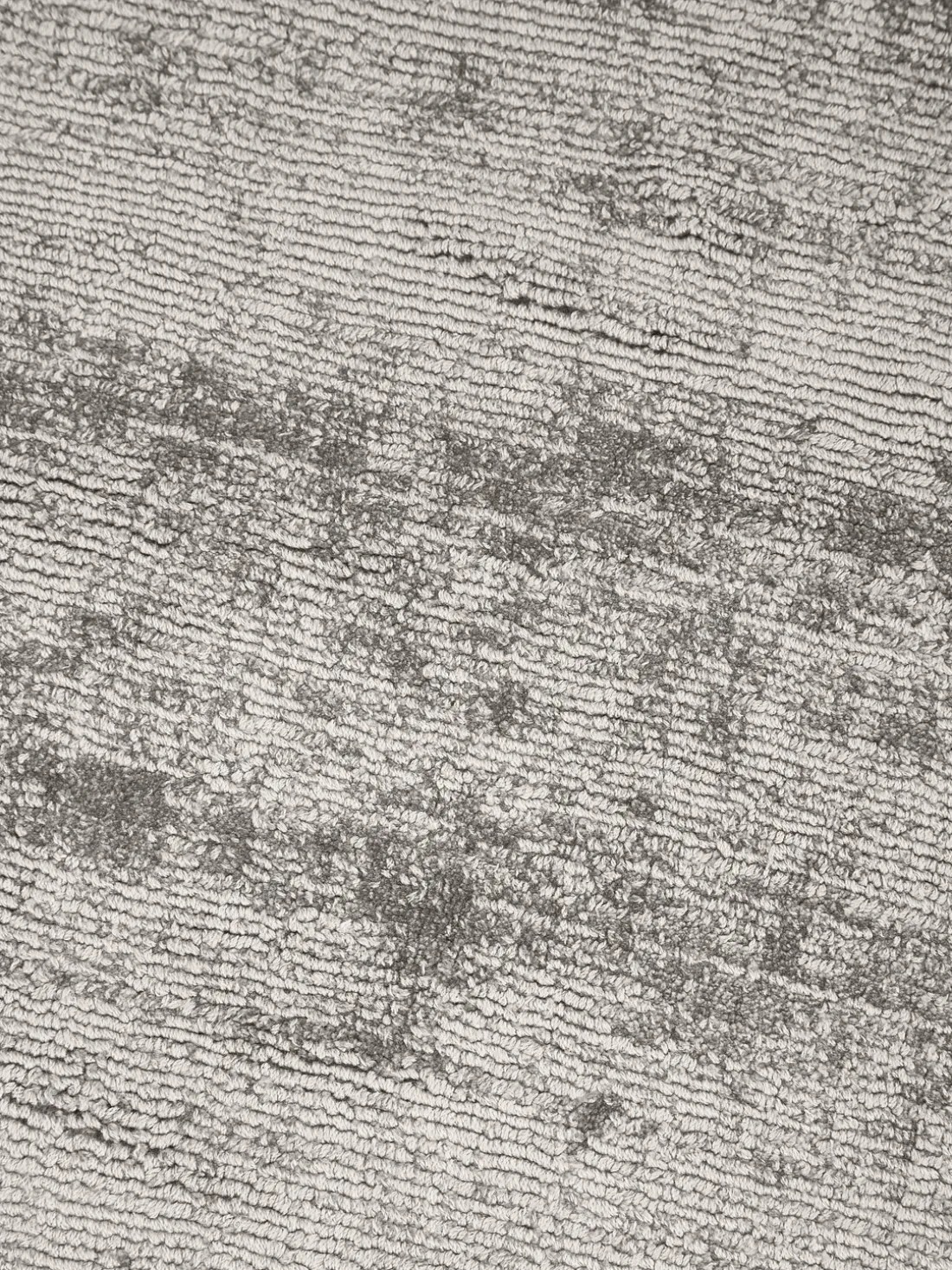 Alfombra redonda artesanal de viscosa Jane