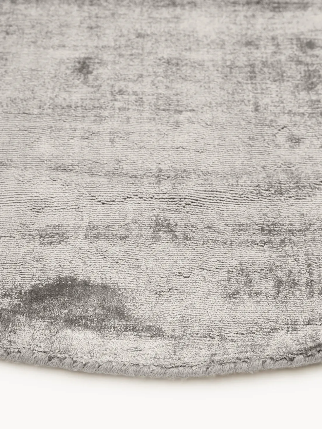 Alfombra redonda artesanal de viscosa Jane