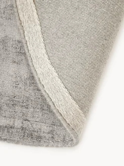 Alfombra redonda artesanal de viscosa Jane