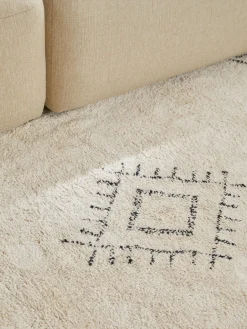 Alfombra redonda artesanal de algodón con flecos Flonn