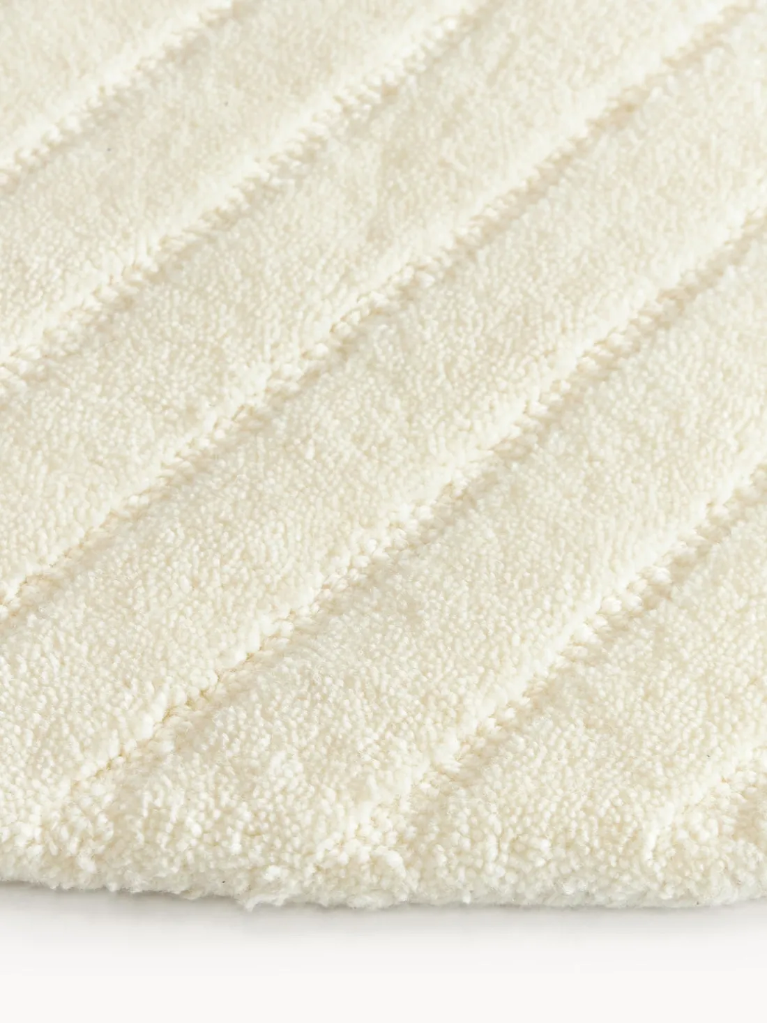 Alfombra redonda artesanal de lana Mason