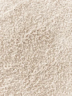 Alfombra redonda artesanal de algodón con flecos Daya