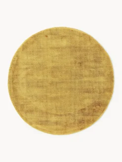 Alfombra redonda artesanal de viscosa Jane