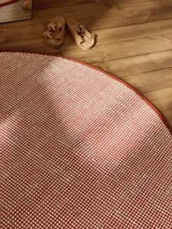 Alfombra redonda artesanal de lana Amaro