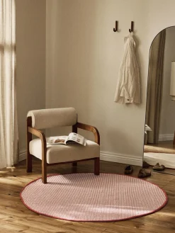 Alfombra redonda artesanal de lana Amaro