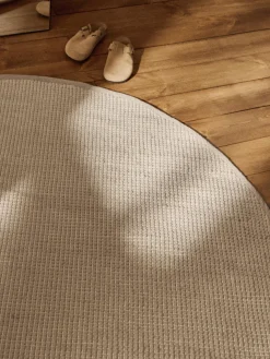 Alfombra redonda artesanal de lana Amaro