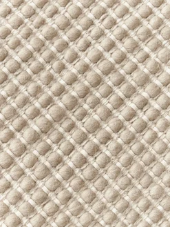 Alfombra redonda artesanal de lana Amaro