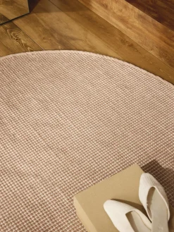 Alfombra redonda artesanal de lana Amaro