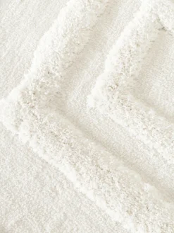 Alfombra redonda de pelo largo texturizada Magda