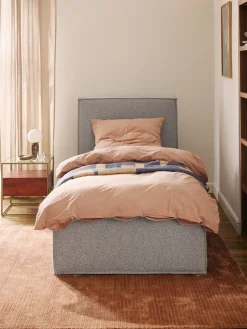 Cama individual tapizada en tejido bouclé Dream