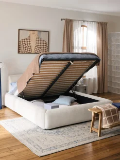 Cama tapizada con espacio de almacenamiento Melva