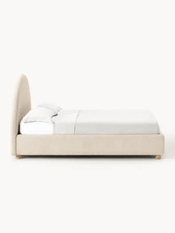 Cama tapizada en tejido bouclé Ebba, con espacio de almacenamiento