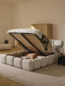 Cama tapizada en tejido bouclé con espacio de almacenamiento Tayla