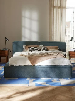 Cama tapizada en tejido bouclé Lennon, con espacio de almacenamiento