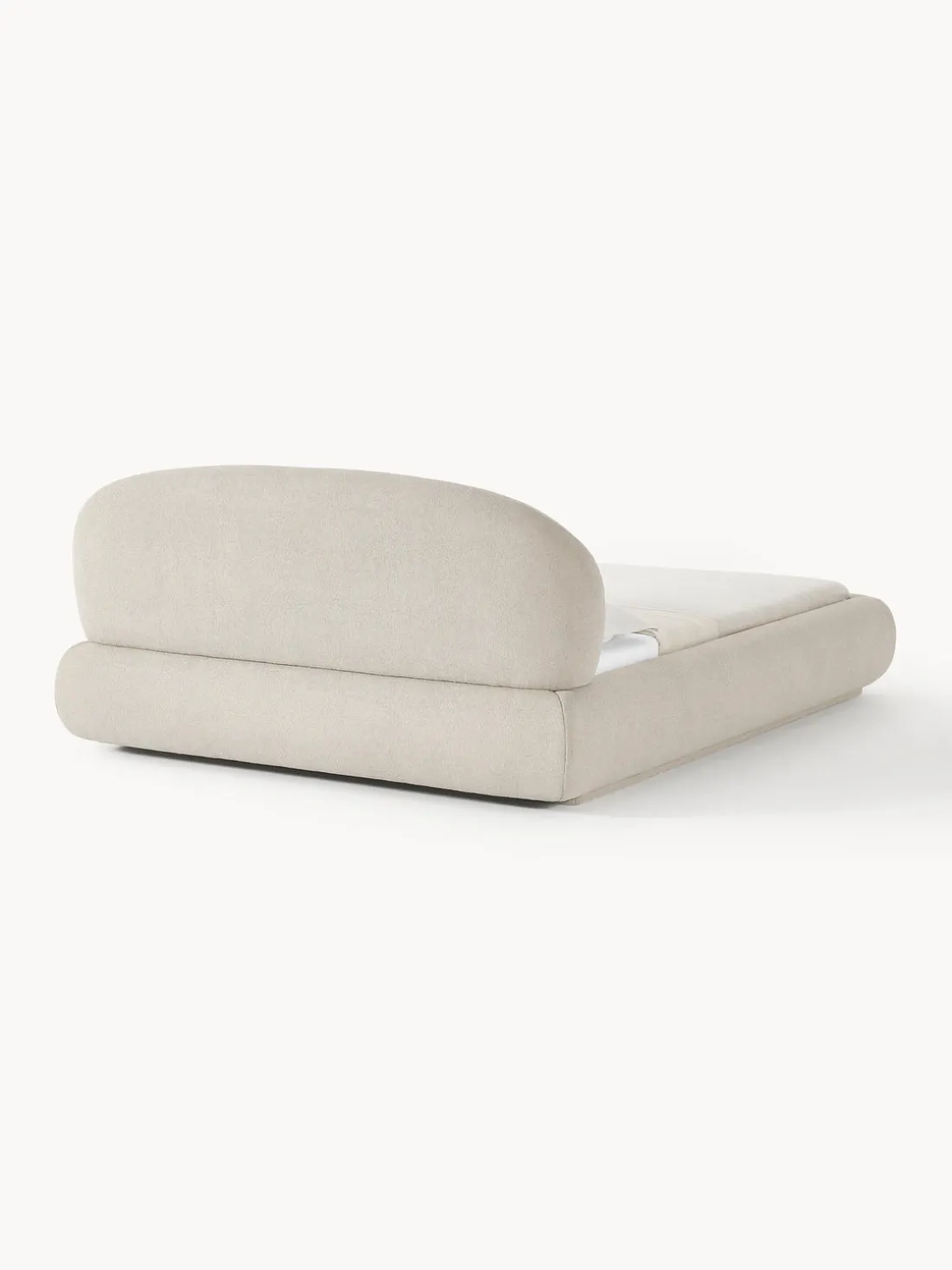 Cama tapizada redondeada en tejido bouclé Alba