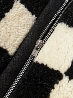 Cojín artesanal de lana Statement