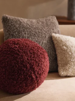 Cojín esférico de borreguillo Dotty