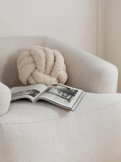 Cojín nudo de borreguillo Dotty