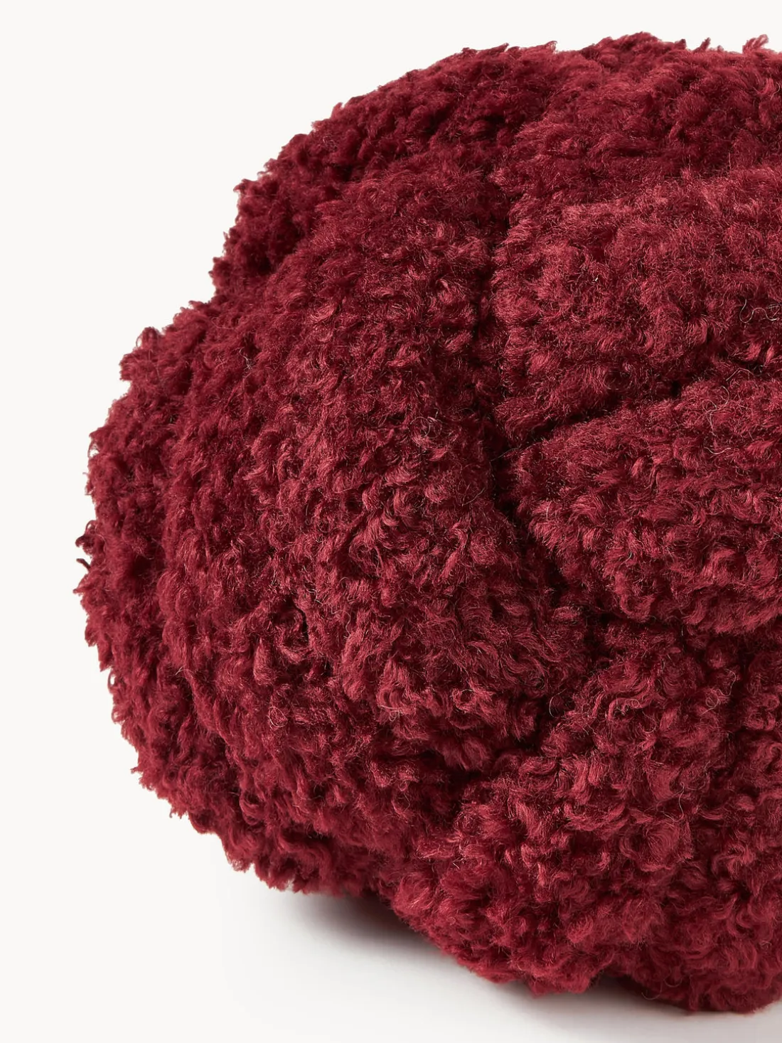 Cojín nudo de borreguillo Dotty