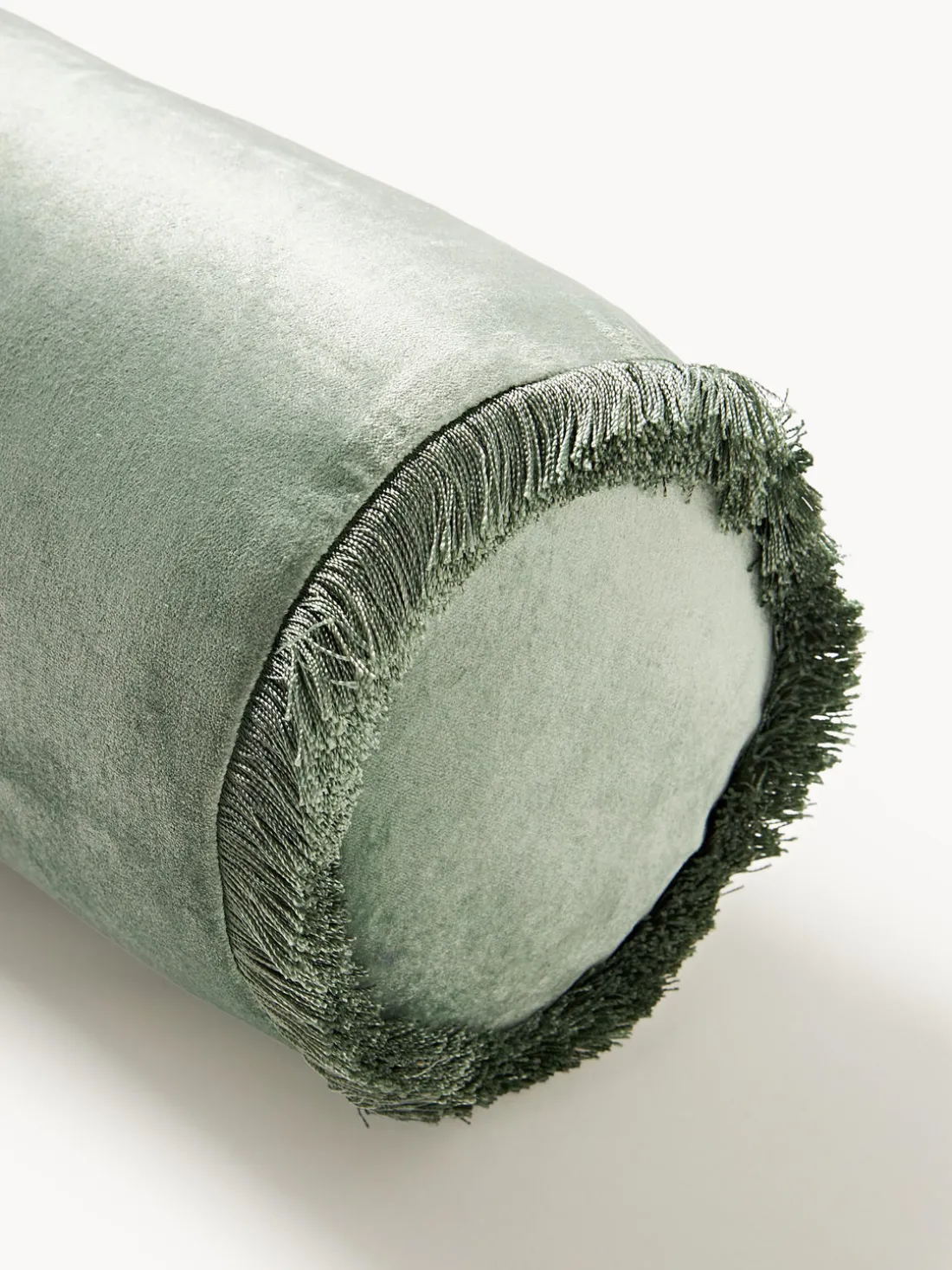 Cojín rulo co flecos Nikita