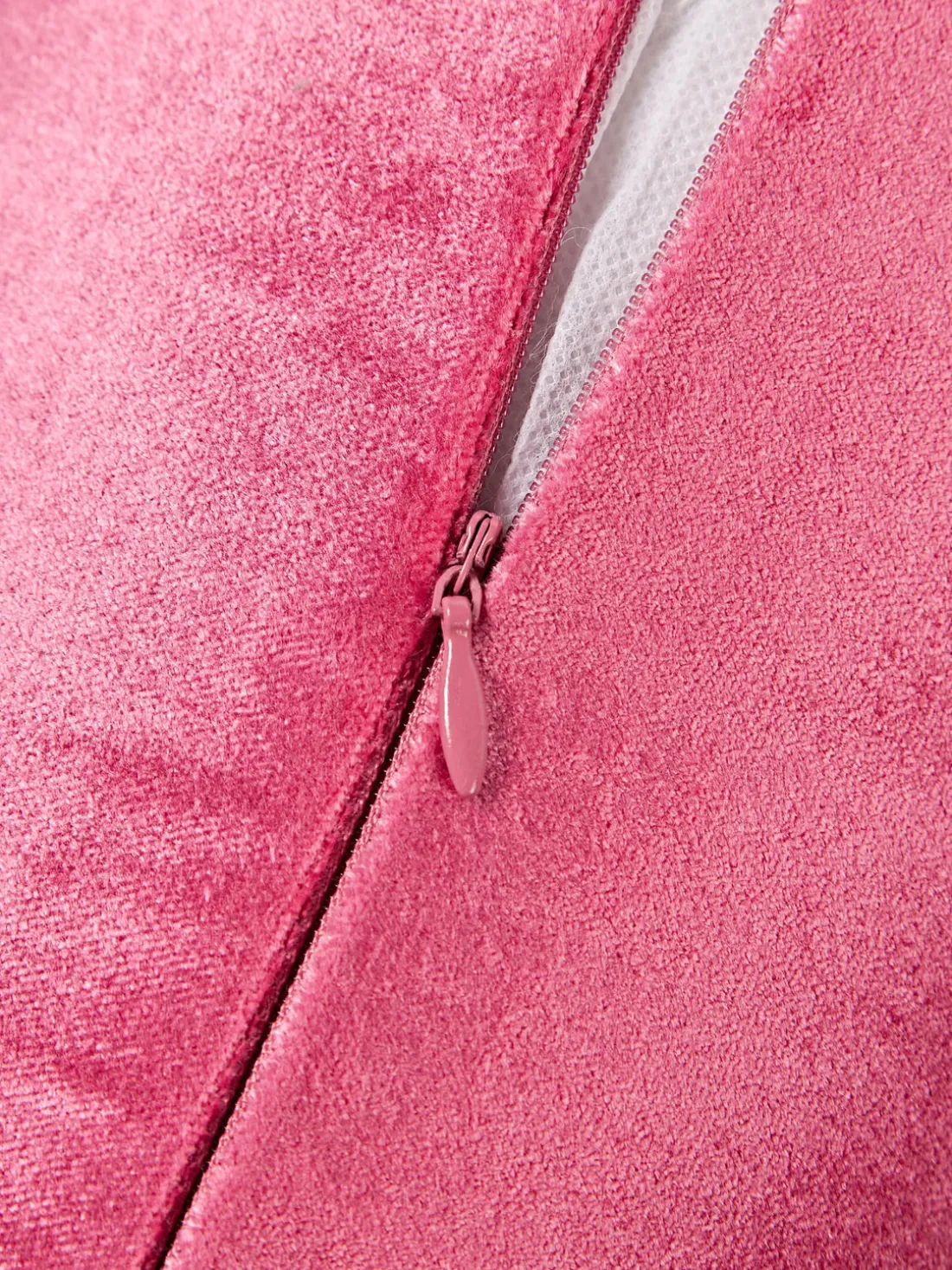 Cojín rulo co flecos Nikita