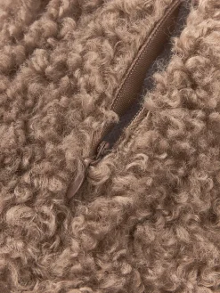 Cojín rulo de borreguillo Dotty