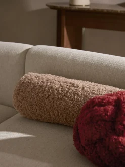 Cojín rulo de borreguillo Dotty